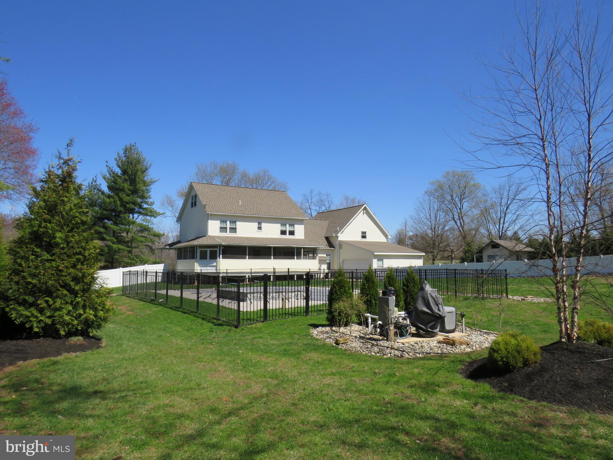 10 Spring Hill Road Perkasie, PA 18944 - Photo 61 of 74 Privacy fenced yard and wrought iron fenced pool