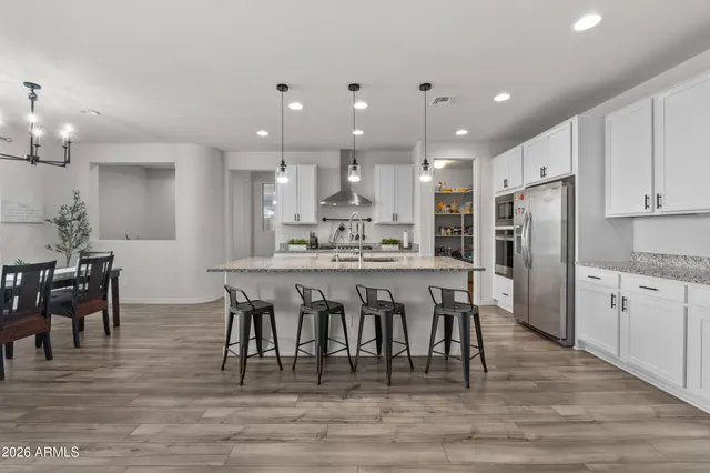 a living room with fireplace furniture and a flat screen tv