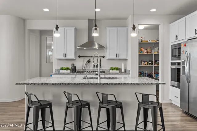a living room with fireplace furniture and a flat screen tv