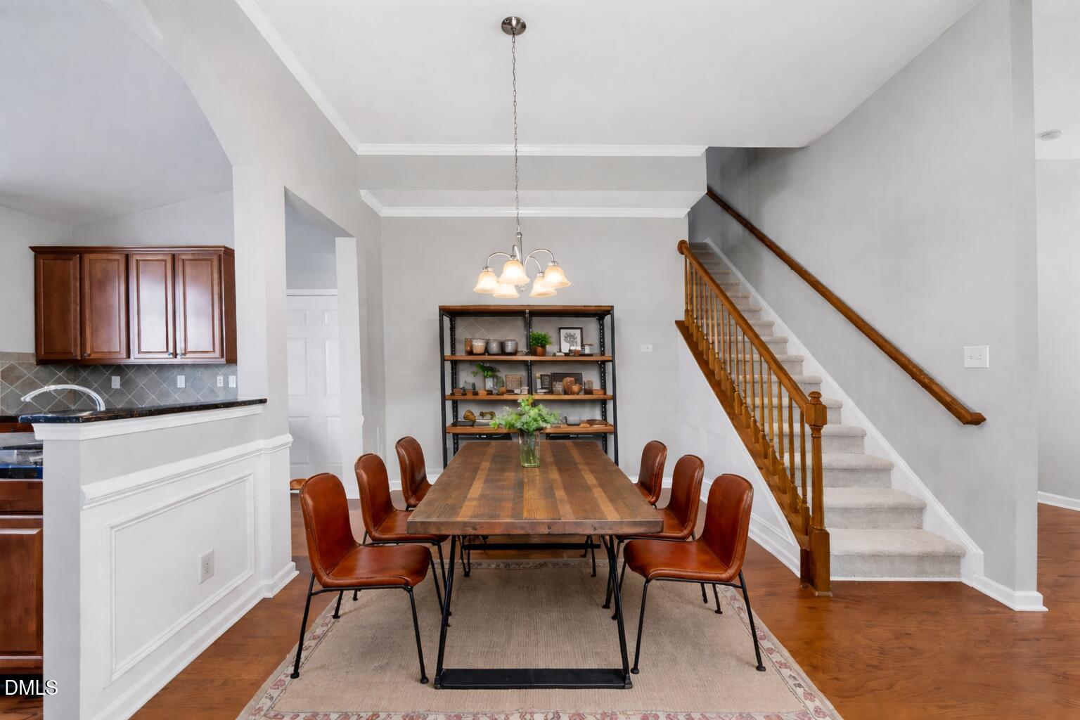 7841 Cape Charles Drive Raleigh, NC 27617 - Photo 10 of 52 Modern dining area with rustic charm