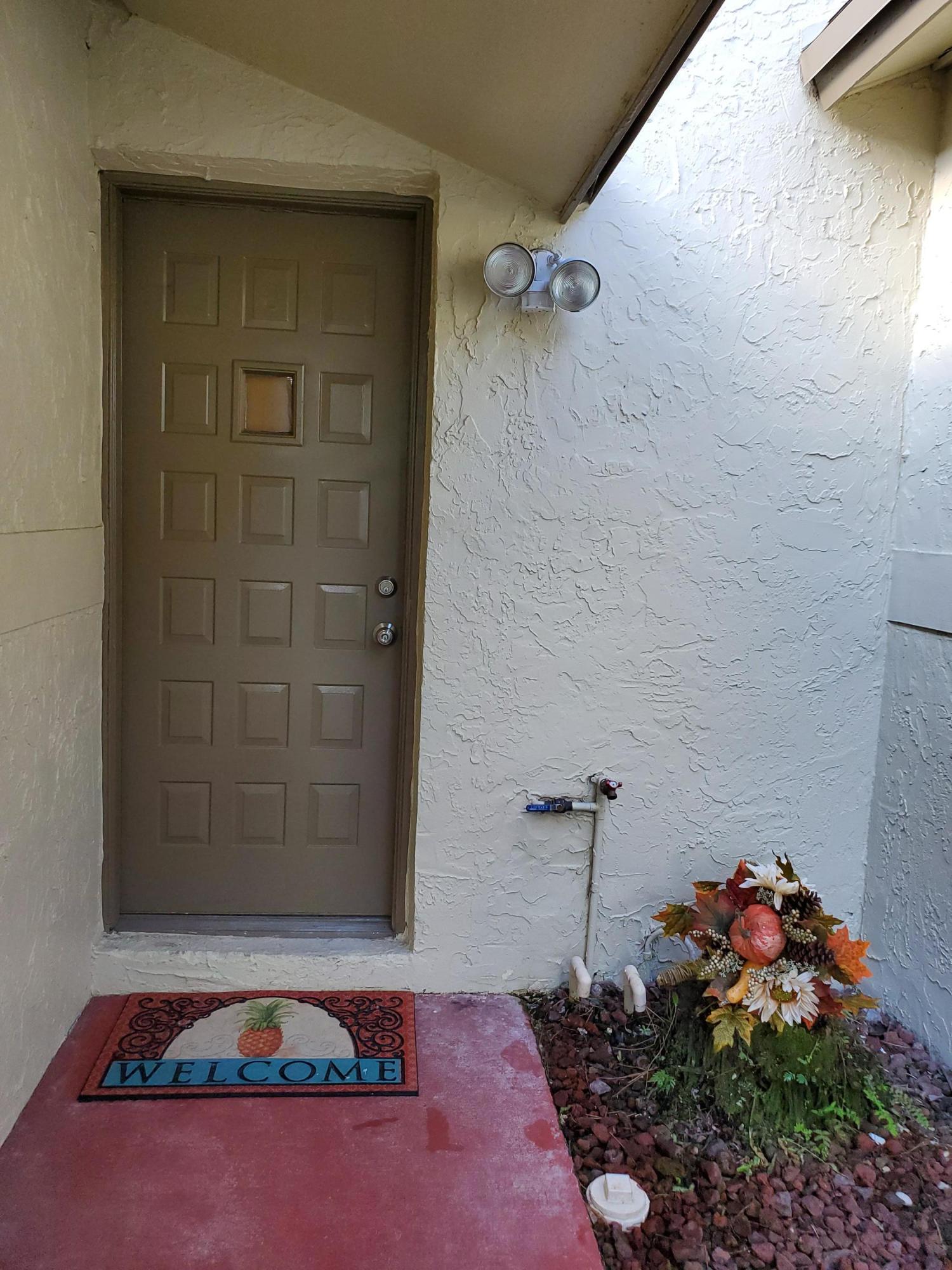 8957 Southwest 21st Court, Unit D Boca Raton, FL 33433 - Photo 2 of 25 FRONT OF THE HOUSE