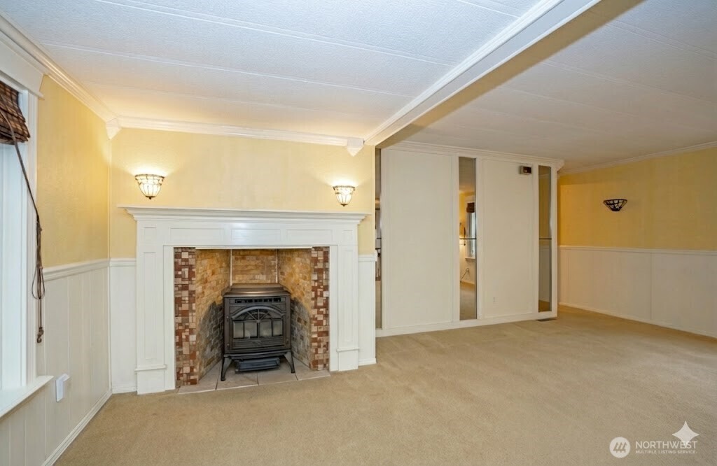 33507 43rd Avenue Southwest Federal Way, WA 98023 - Photo 13 of 40 a view of an empty room with fire place and a fireplace