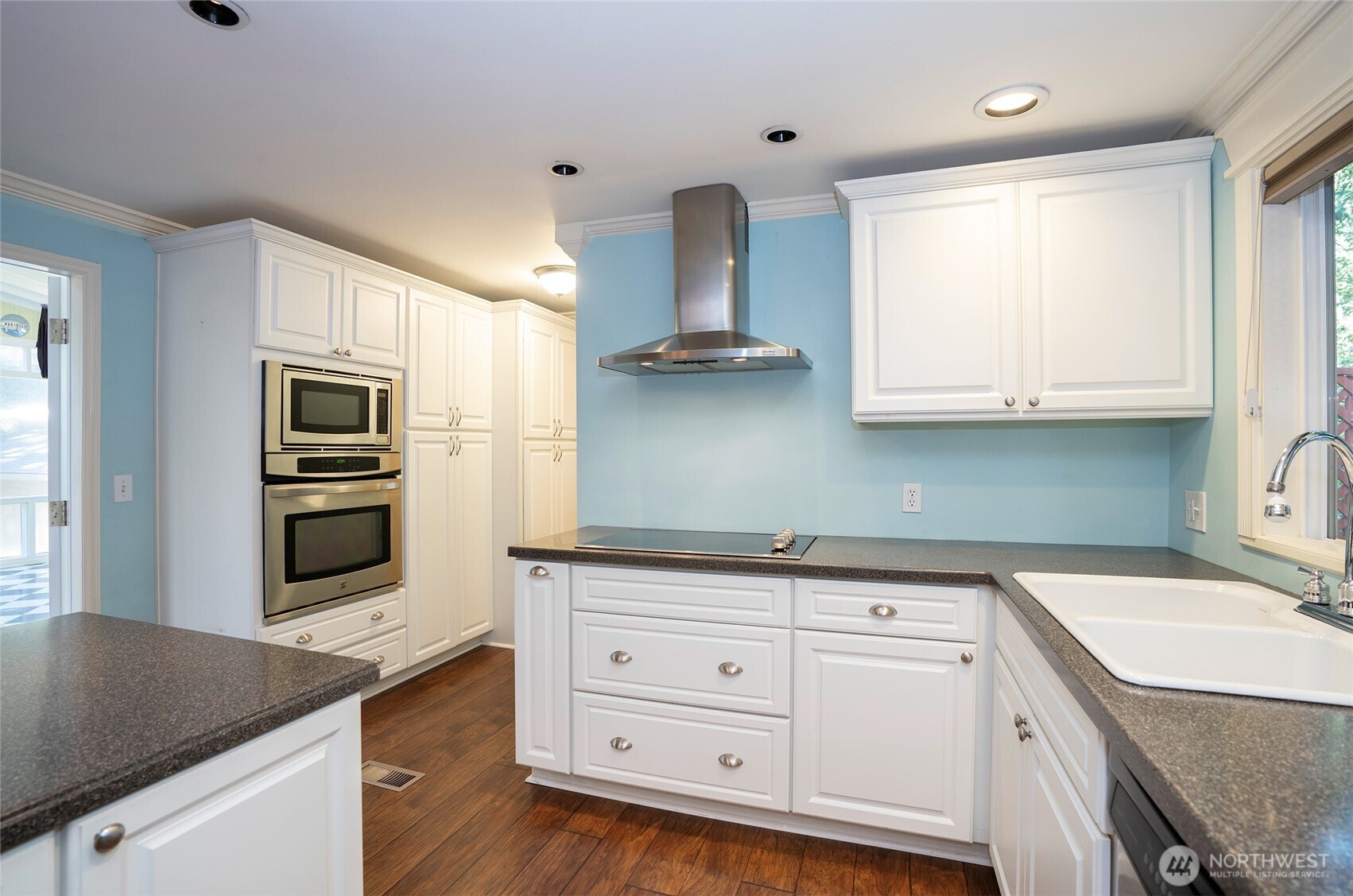 33507 43rd Avenue Southwest Federal Way, WA 98023 - Photo 18 of 40 a kitchen with granite countertop a sink stainless steel appliances and cabinets
