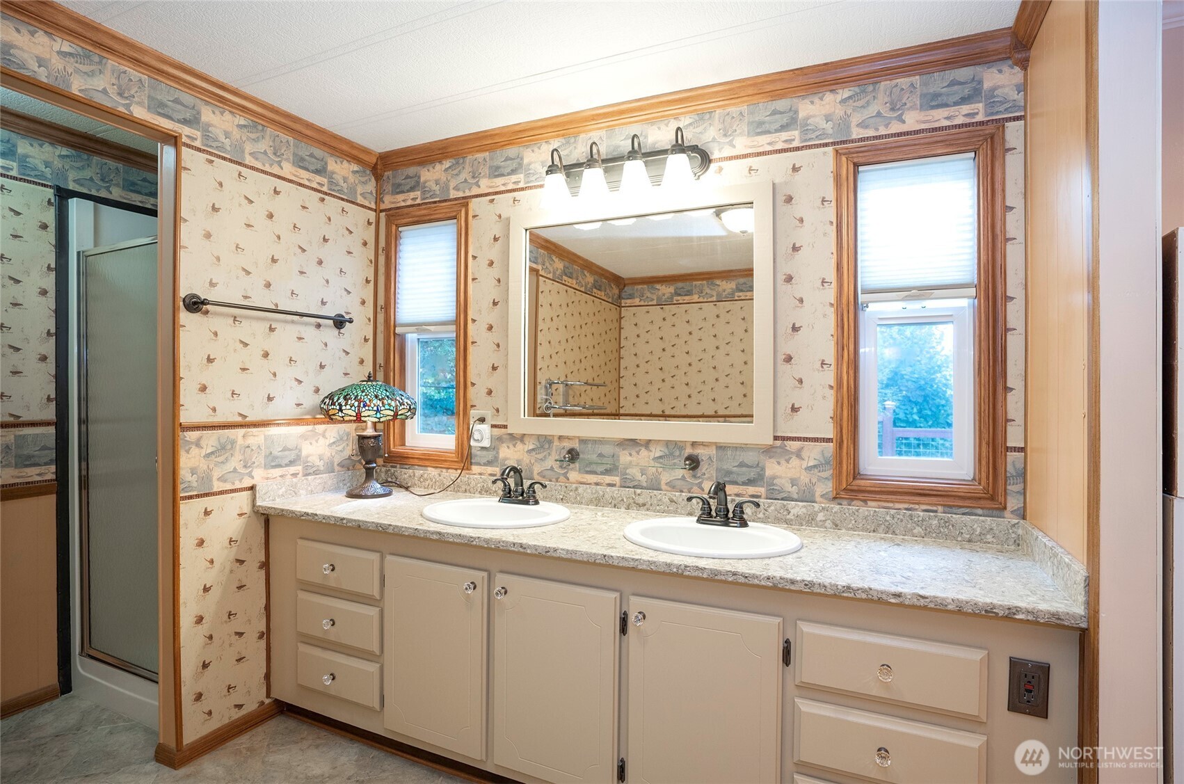 33507 43rd Avenue Southwest Federal Way, WA 98023 - Photo 28 of 40 a bathroom with a granite countertop sink mirror and a