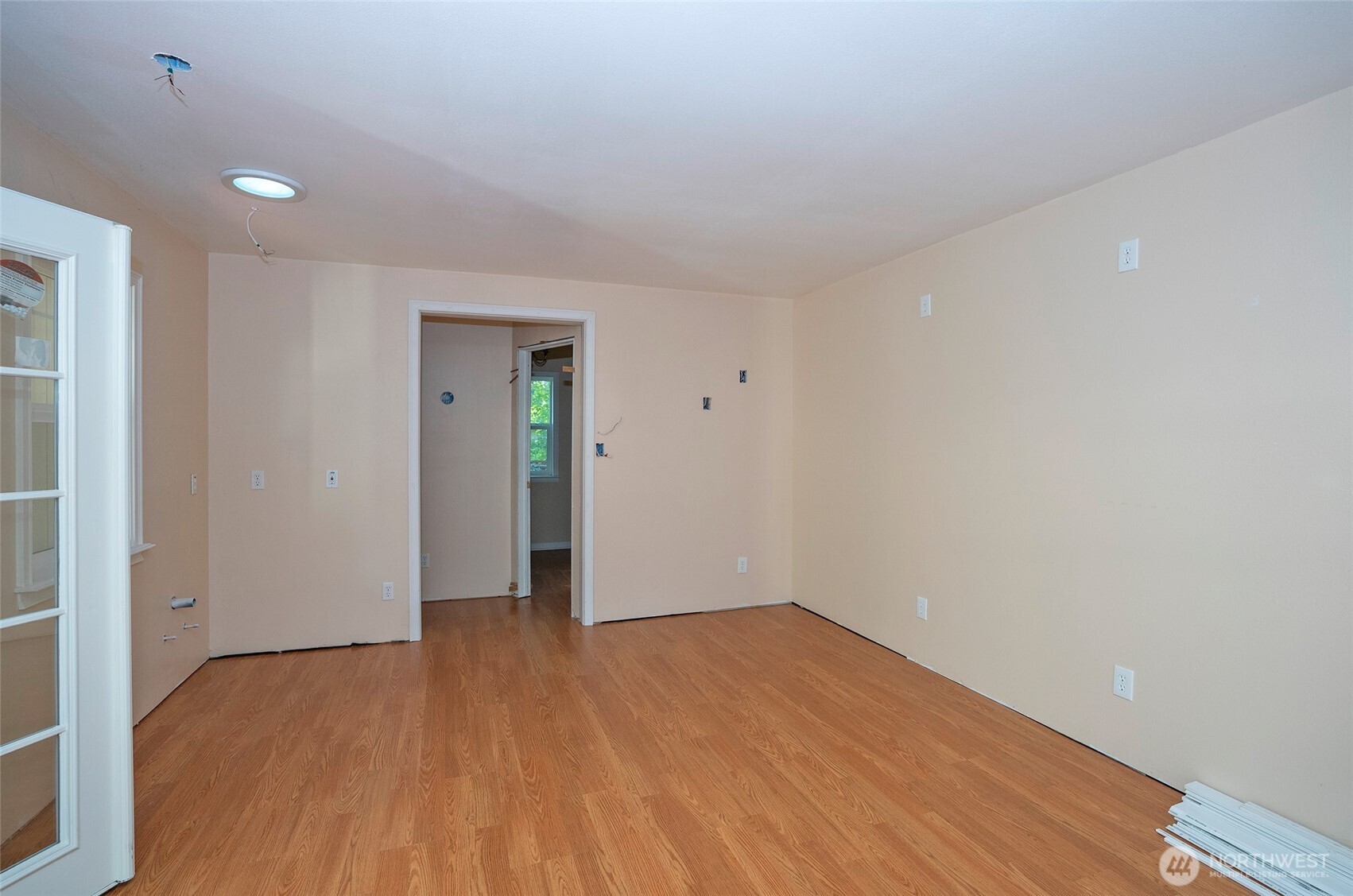 33507 43rd Avenue Southwest Federal Way, WA 98023 - Photo 36 of 40 a view of an empty room with wooden floor and a window