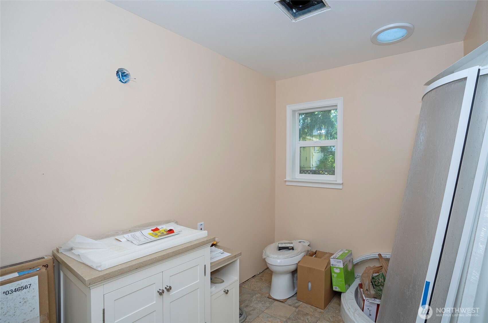 33507 43rd Avenue Southwest Federal Way, WA 98023 - Photo 38 of 40 a bathroom with a sink toilet and a window