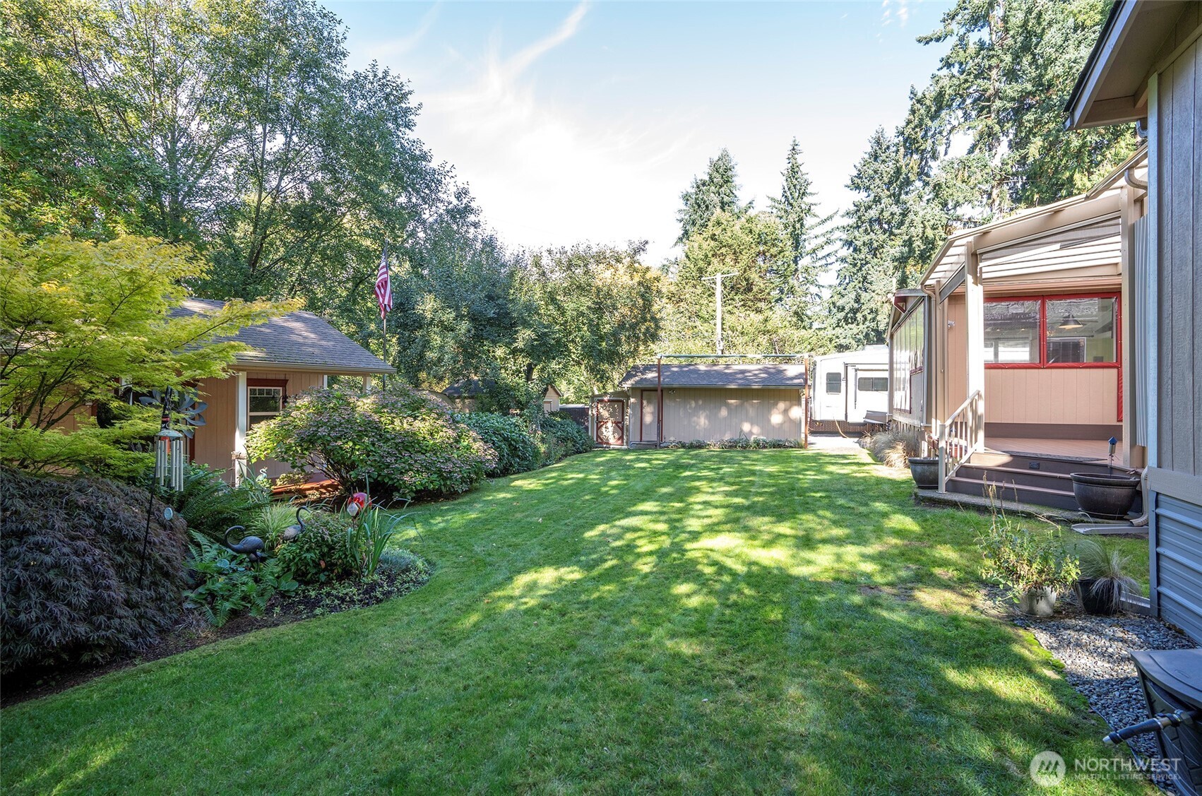 33507 43rd Avenue Southwest Federal Way, WA 98023 - Photo 7 of 40 a view of a house with a backyard and sitting area