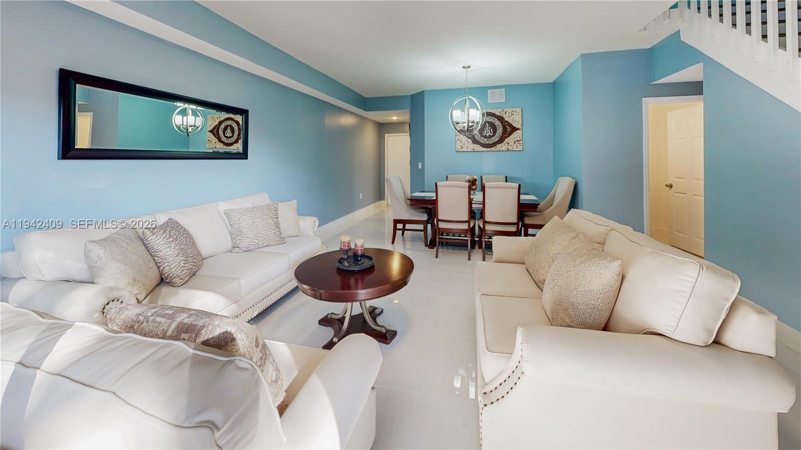 10210 Southwest 154th Place, Unit 1118 Miami, FL 33196 - Photo 11 of 71 a living room with furniture