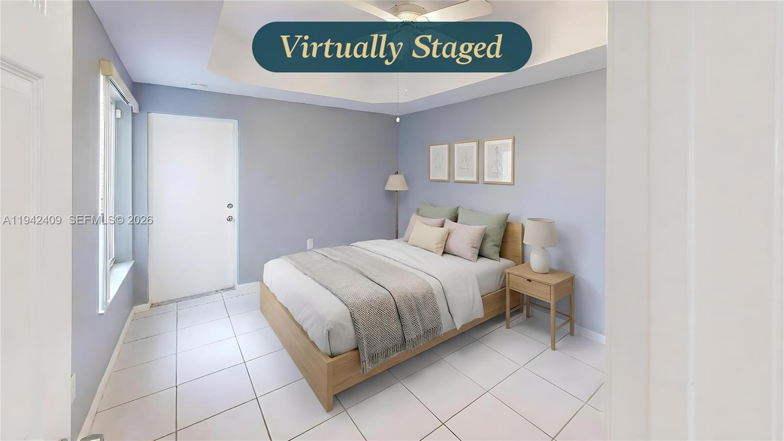 10210 Southwest 154th Place, Unit 1118 Miami, FL 33196 - Photo 22 of 71 a bedroom with a bed and a window