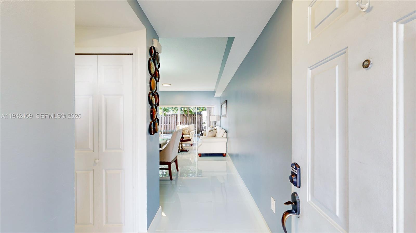 10210 Southwest 154th Place, Unit 1118 Miami, FL 33196 - Photo 5 of 59 a view of entryway with livingroom