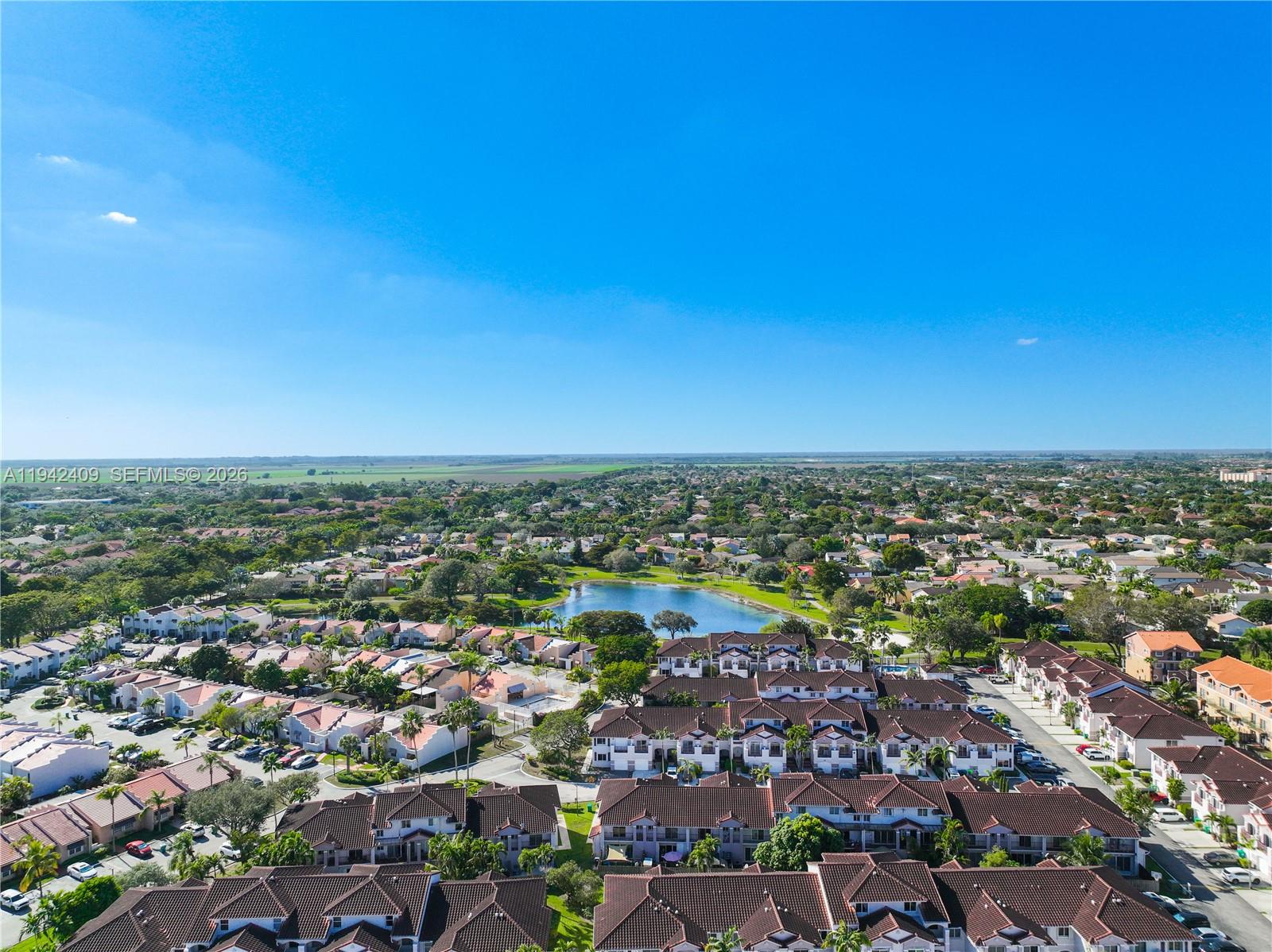 10210 Southwest 154th Place, Unit 1118 Miami, FL 33196 - Photo 57 of 59 an aerial view of a city