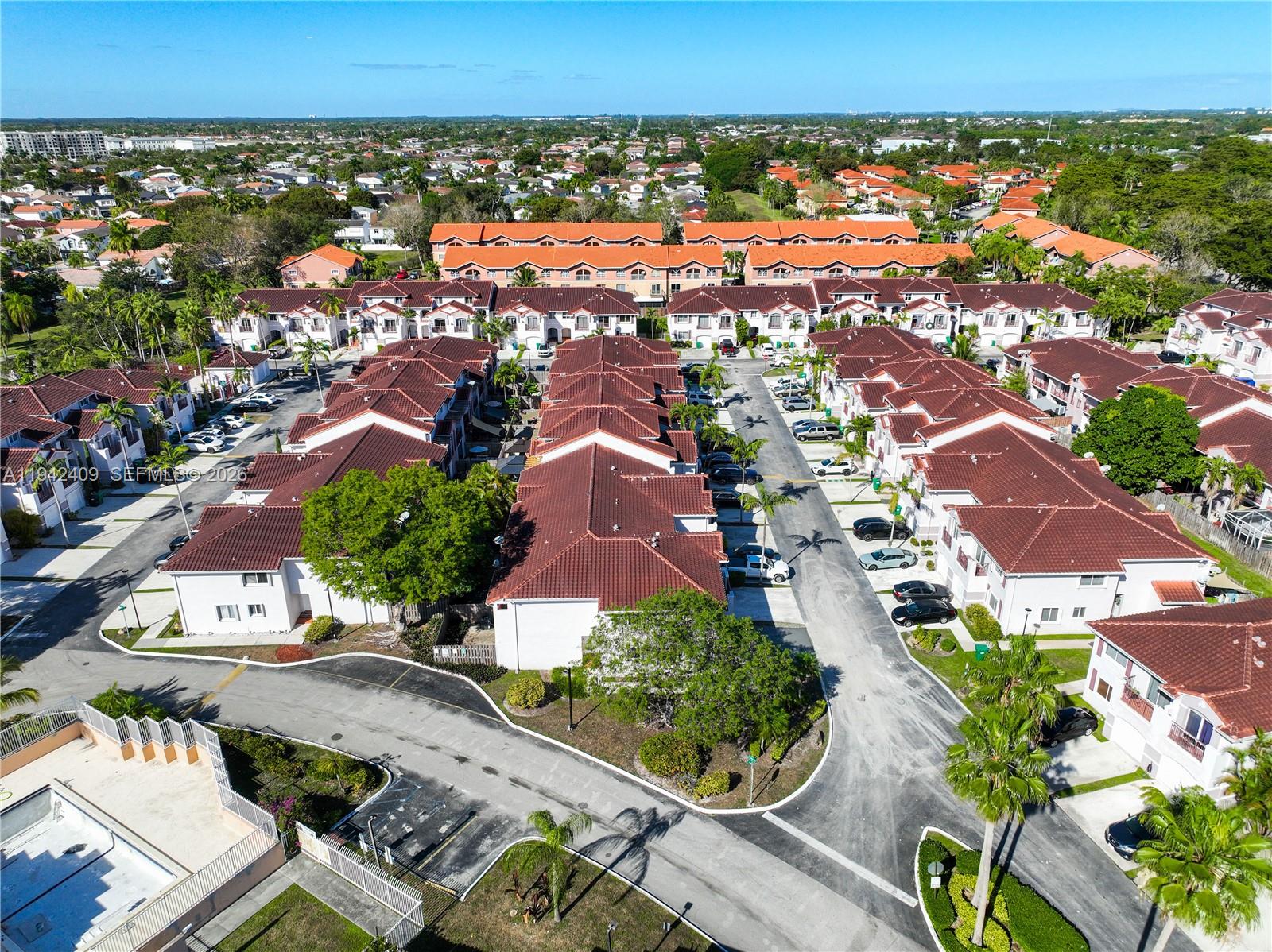 10210 Southwest 154th Place, Unit 1118 Miami, FL 33196 - Photo 64 of 71 an aerial view of a city