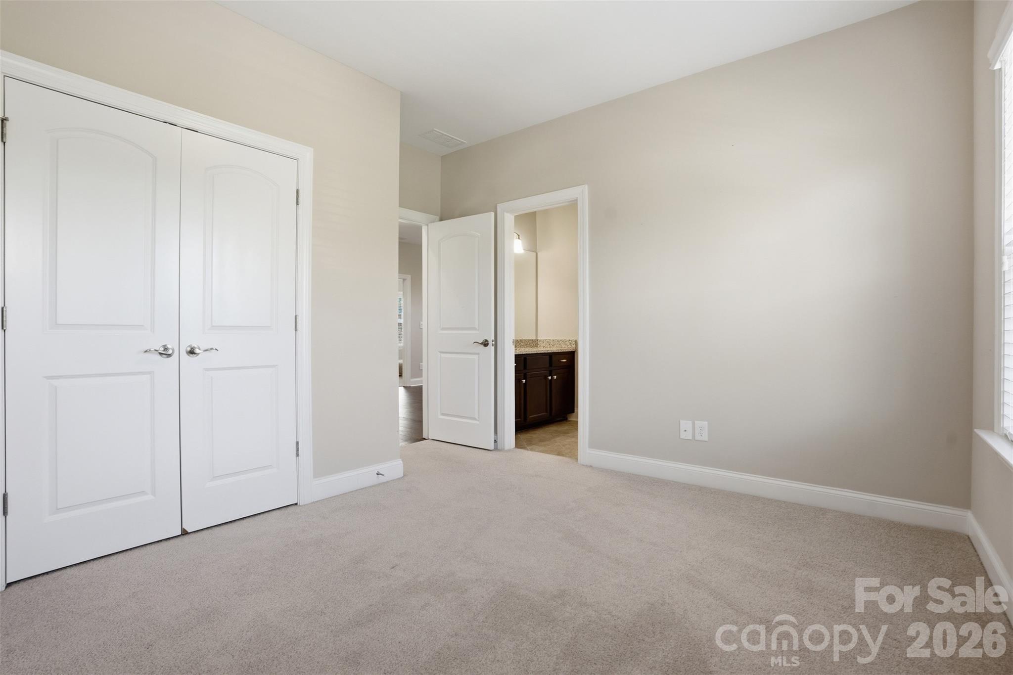 14022 Salem Ridge Road Huntersville, NC 28078 - Photo 22 of 38 a view of an empty room with closet and entryway