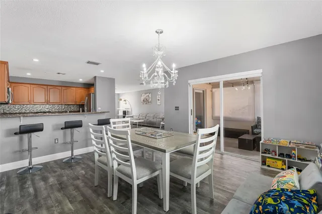 a utility room with sink dryer and washer
