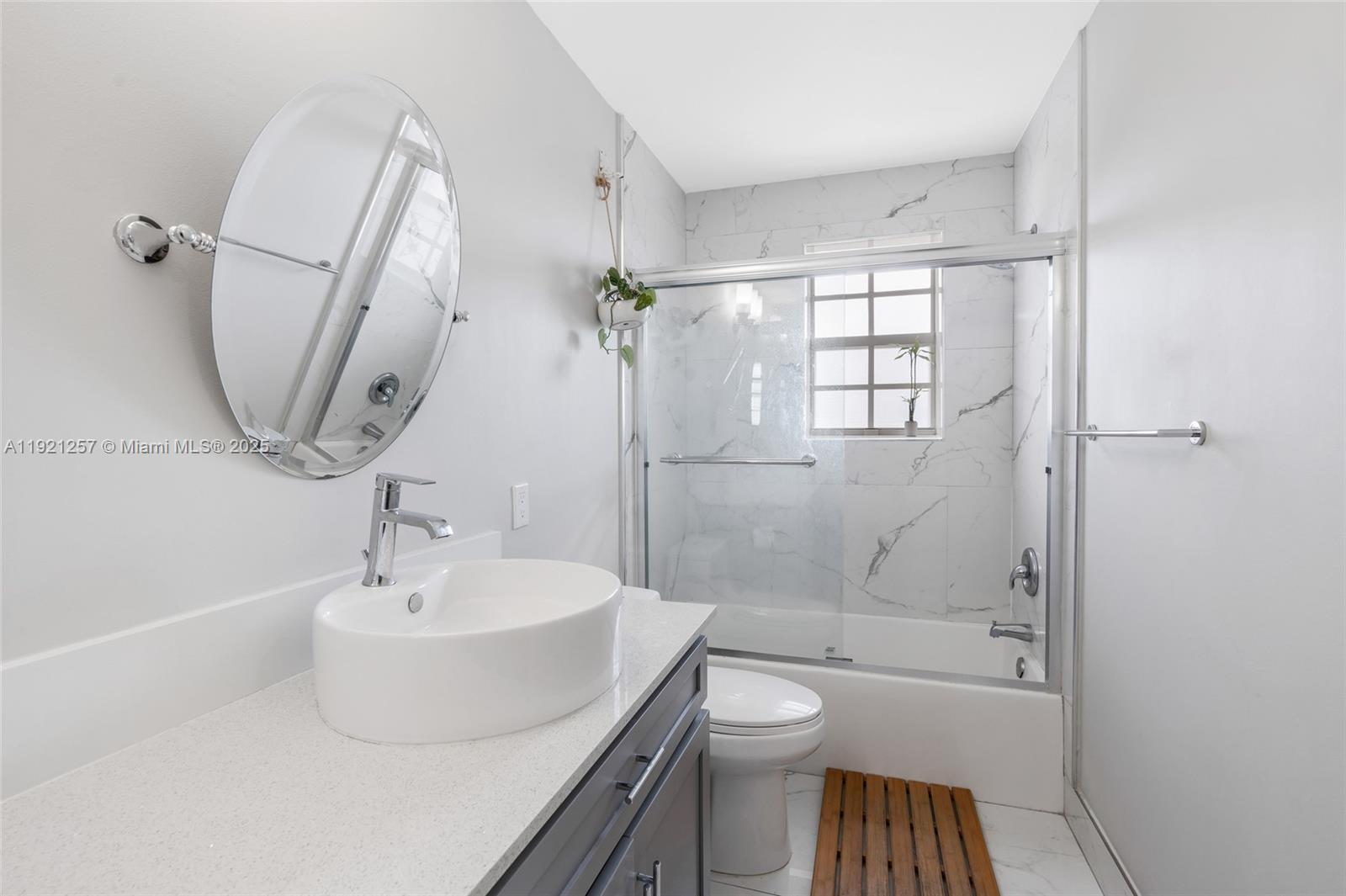 4055 Eastridge Drive Deerfield Beach, FL 33064 - Photo 36 of 56 a bathroom with a sink toilet and shower