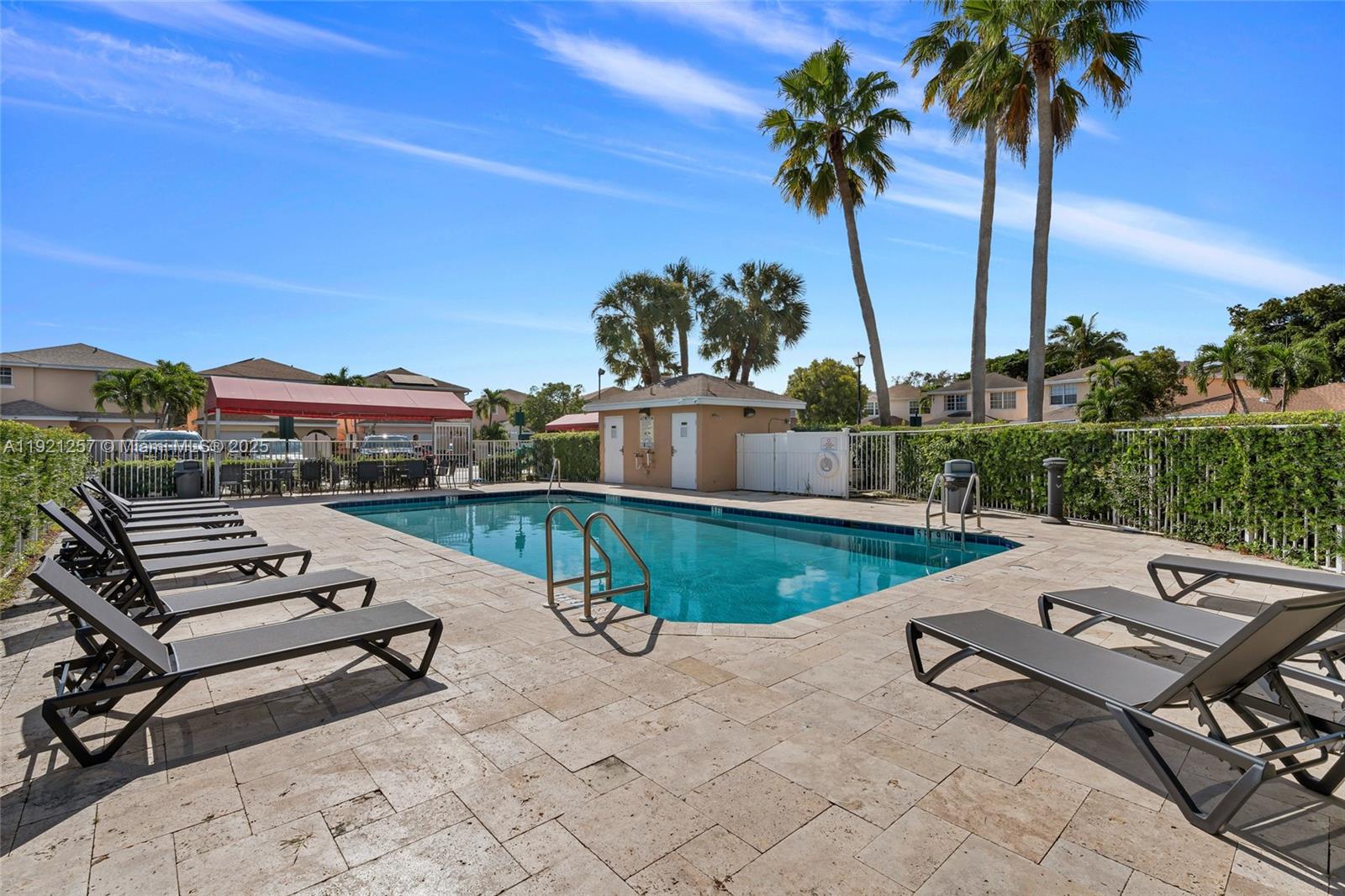 4055 Eastridge Drive Deerfield Beach, FL 33064 - Photo 49 of 56 a view of a terrace with chairs
