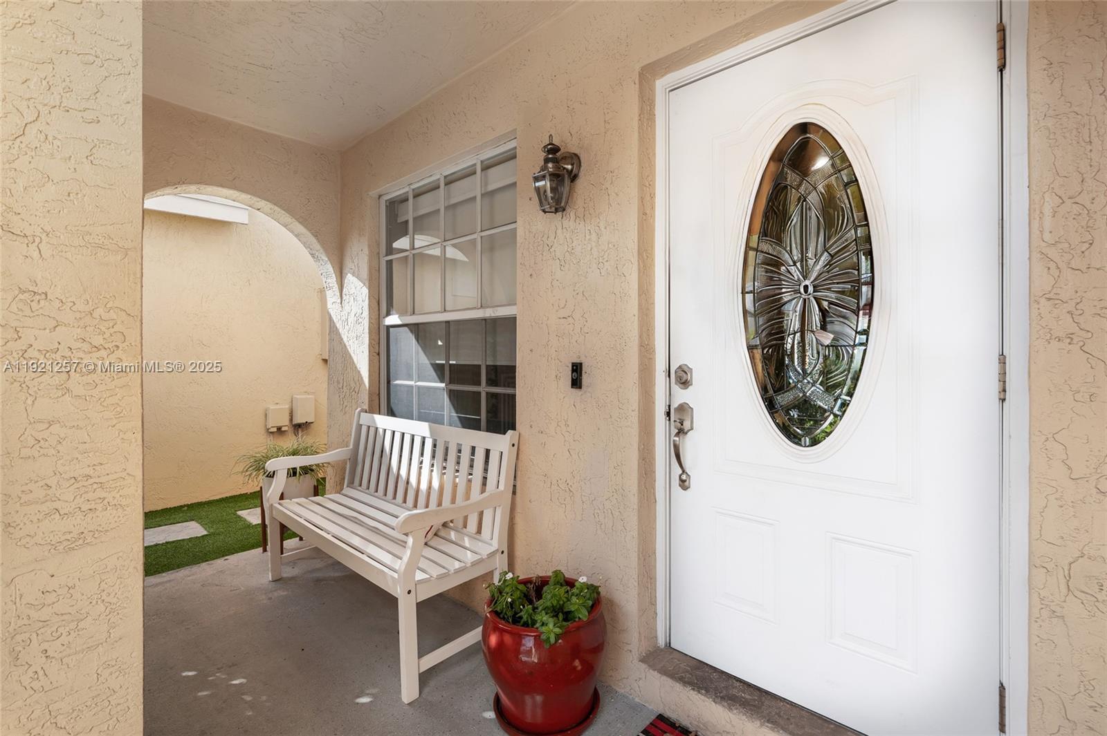 4055 Eastridge Drive Deerfield Beach, FL 33064 - Photo 5 of 56 a view of entryway with wooden floor
