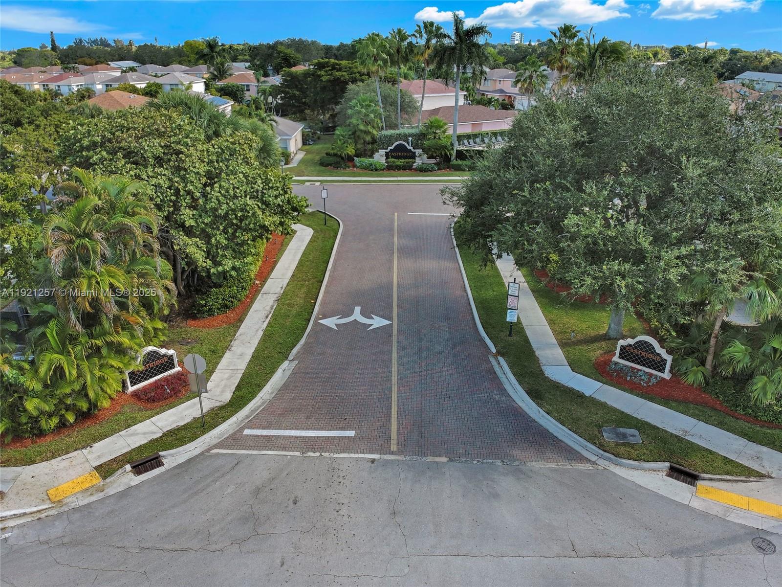 4055 Eastridge Drive Deerfield Beach, FL 33064 - Photo 55 of 56 a view of a park with large trees