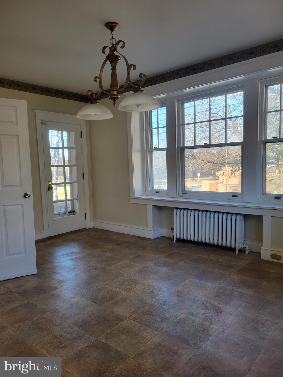 1517 North 13th Street Reading, PA 19604 - Photo 7 of 18 a view of an empty room with a window