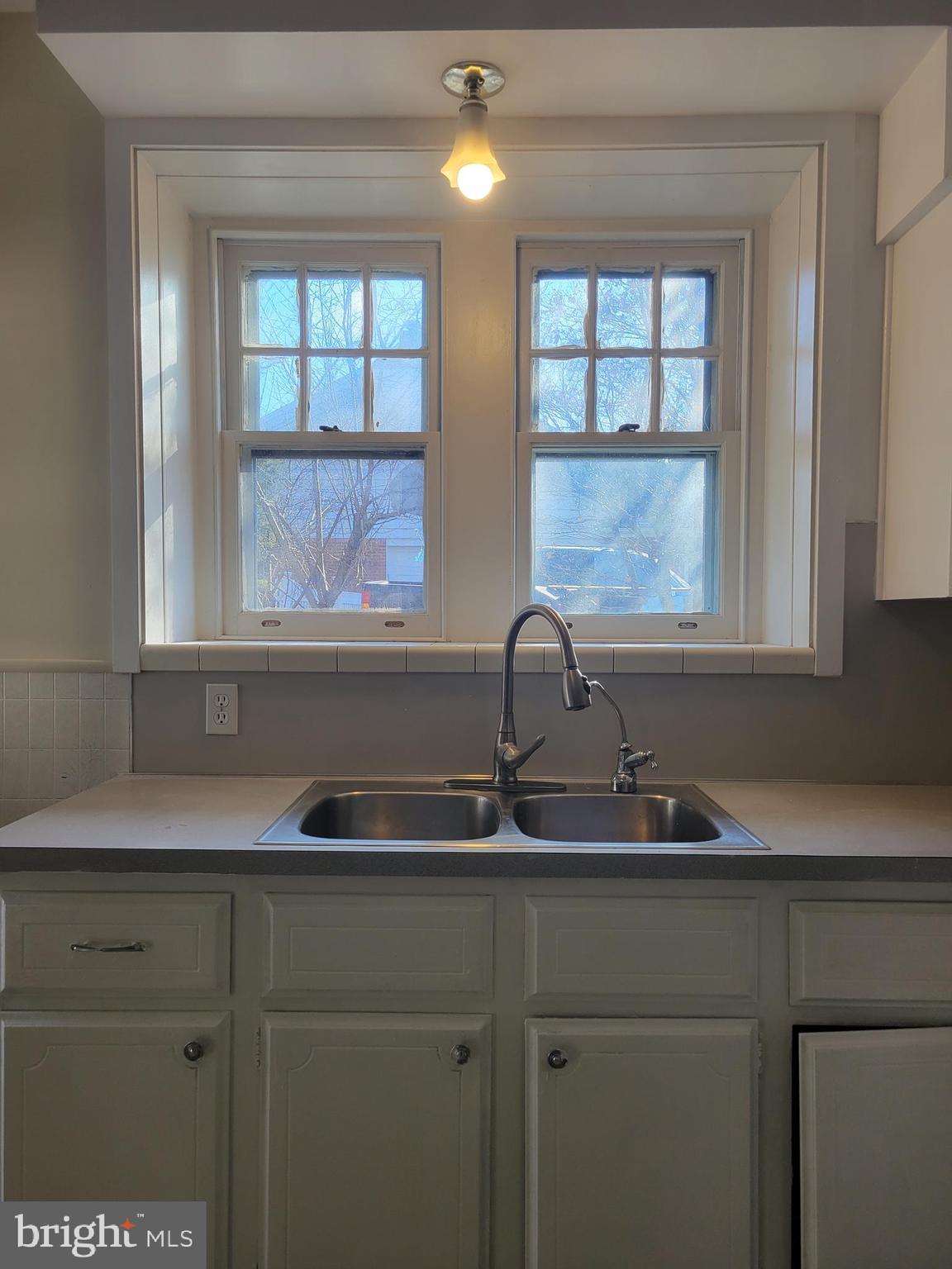 1517 North 13th Street Reading, PA 19604 - Photo 9 of 18 a kitchen with a sink and a window