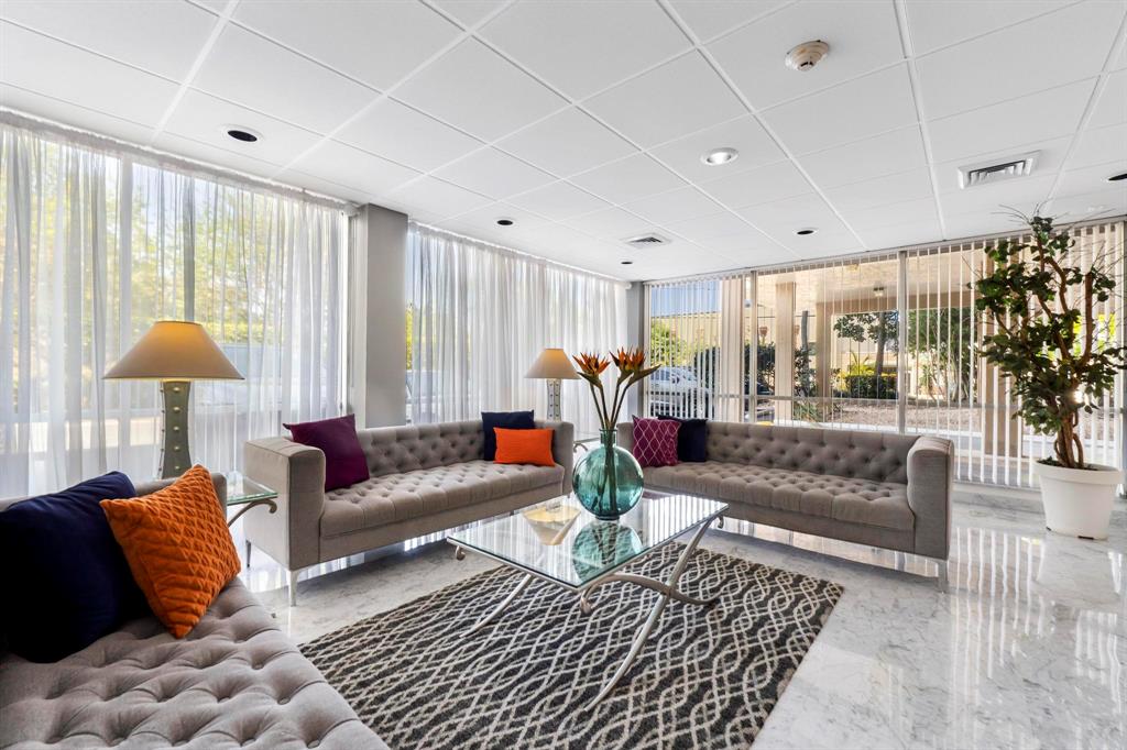 1625 Southeast 10th Avenue, Unit 508 Fort Lauderdale, FL 33316 - Photo 18 of 22 a living room with furniture and a large window