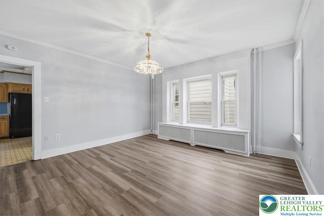 1229 Main Street Northampton, PA 18067 - Photo 11 of 24 wooden floor in an empty room with a window