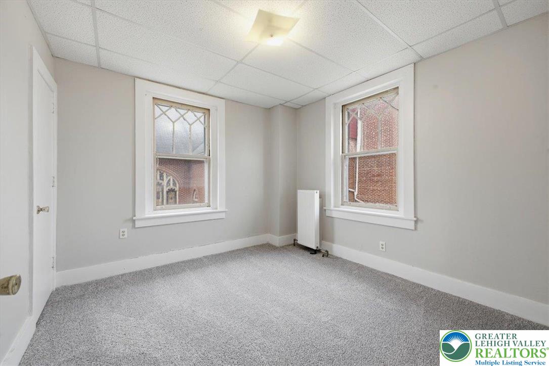 1229 Main Street Northampton, PA 18067 - Photo 18 of 24 an empty room with windows
