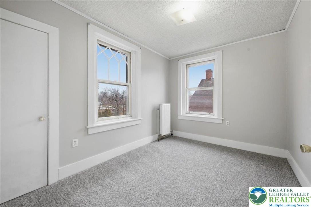 1229 Main Street Northampton, PA 18067 - Photo 20 of 24 a view of an empty room with a window