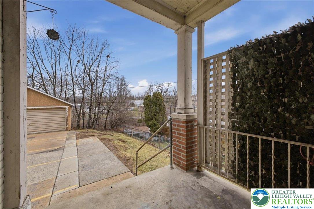 1229 Main Street Northampton, PA 18067 - Photo 24 of 24 a view of a balcony with wooden fence and floor