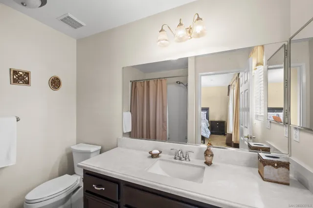 a backyard of a house with outdoor seating