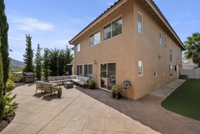 a view of a swimming pool with lounge chair