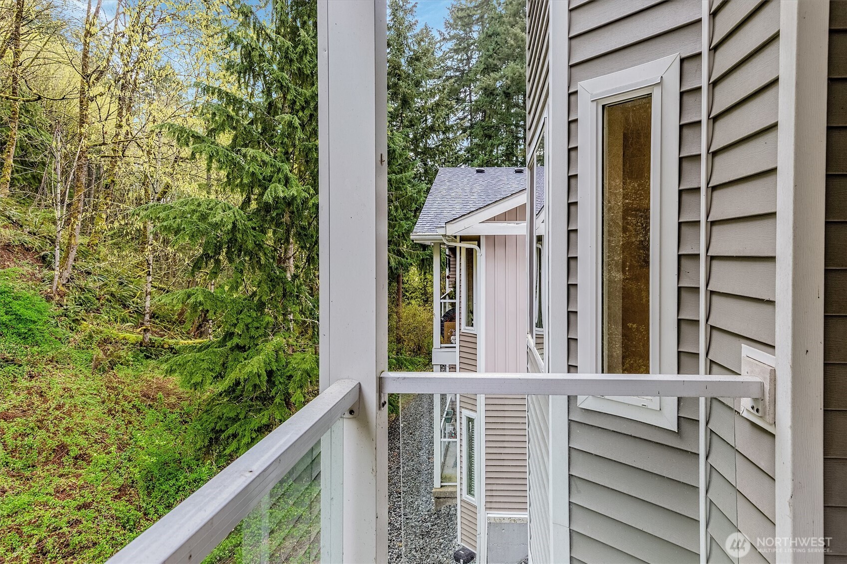 715 Harrington Place Southeast, Unit 2140 Renton, WA 98058 - Photo 13 of 36 a view of a balcony with an outdoor space