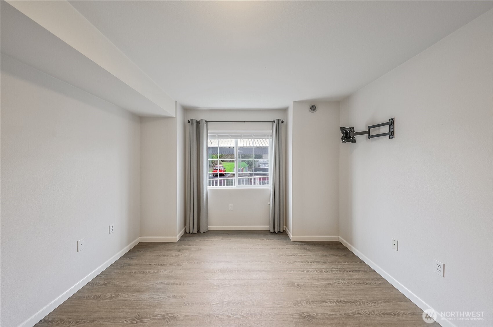 715 Harrington Place Southeast, Unit 2140 Renton, WA 98058 - Photo 24 of 36 a view of an empty room with a window