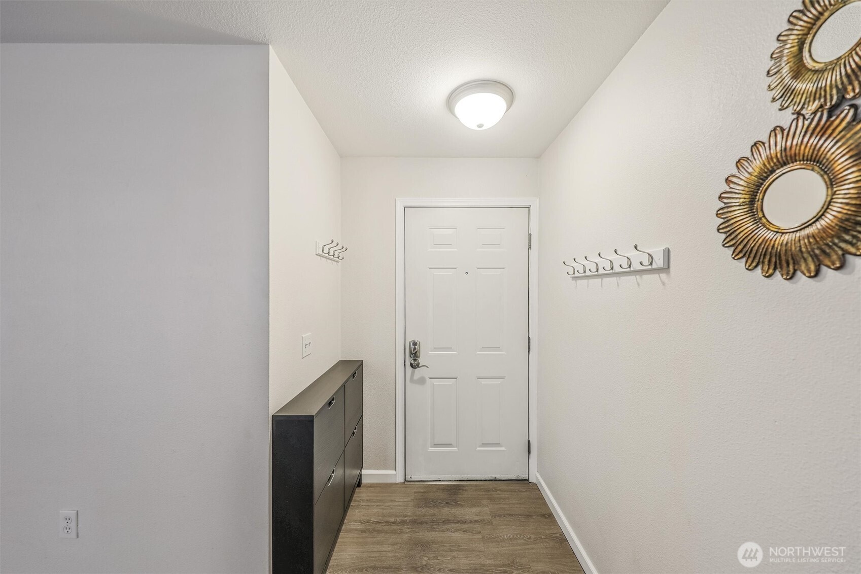 715 Harrington Place Southeast, Unit 2140 Renton, WA 98058 - Photo 3 of 36 a view of a storage & utility room in a kitchen