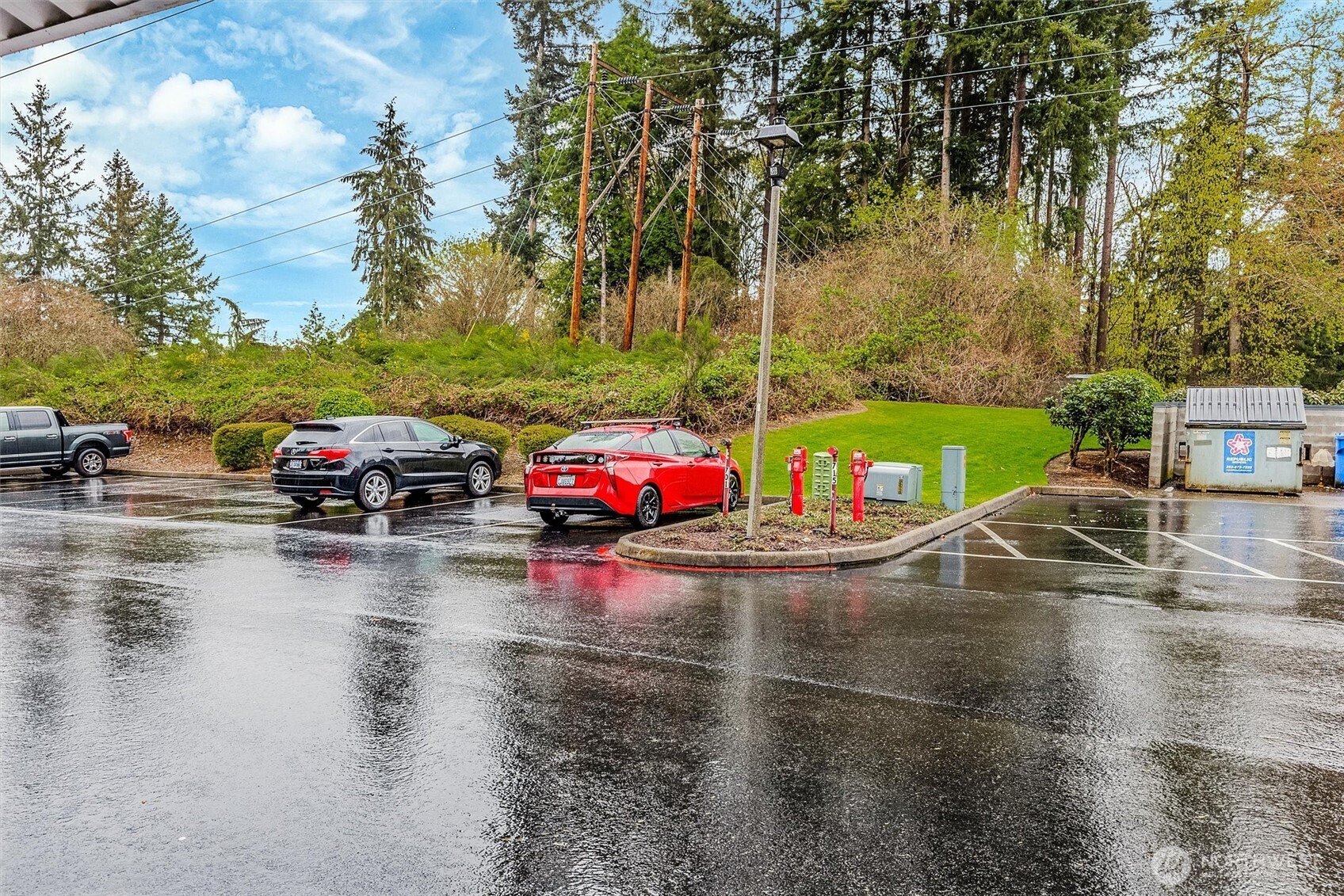 715 Harrington Place Southeast, Unit 2140 Renton, WA 98058 - Photo 32 of 36 a view of a street with cars
