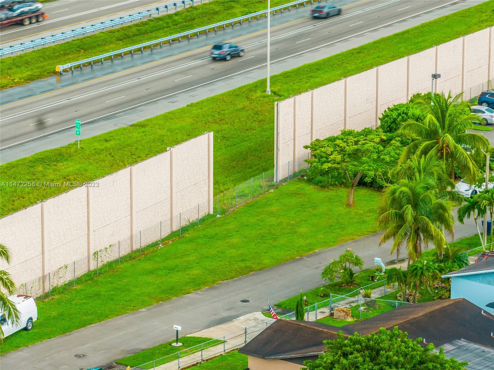 256 Sw Street Homestead, FL 33032 - Photo 12 of 12 a view of a backyard with a garden