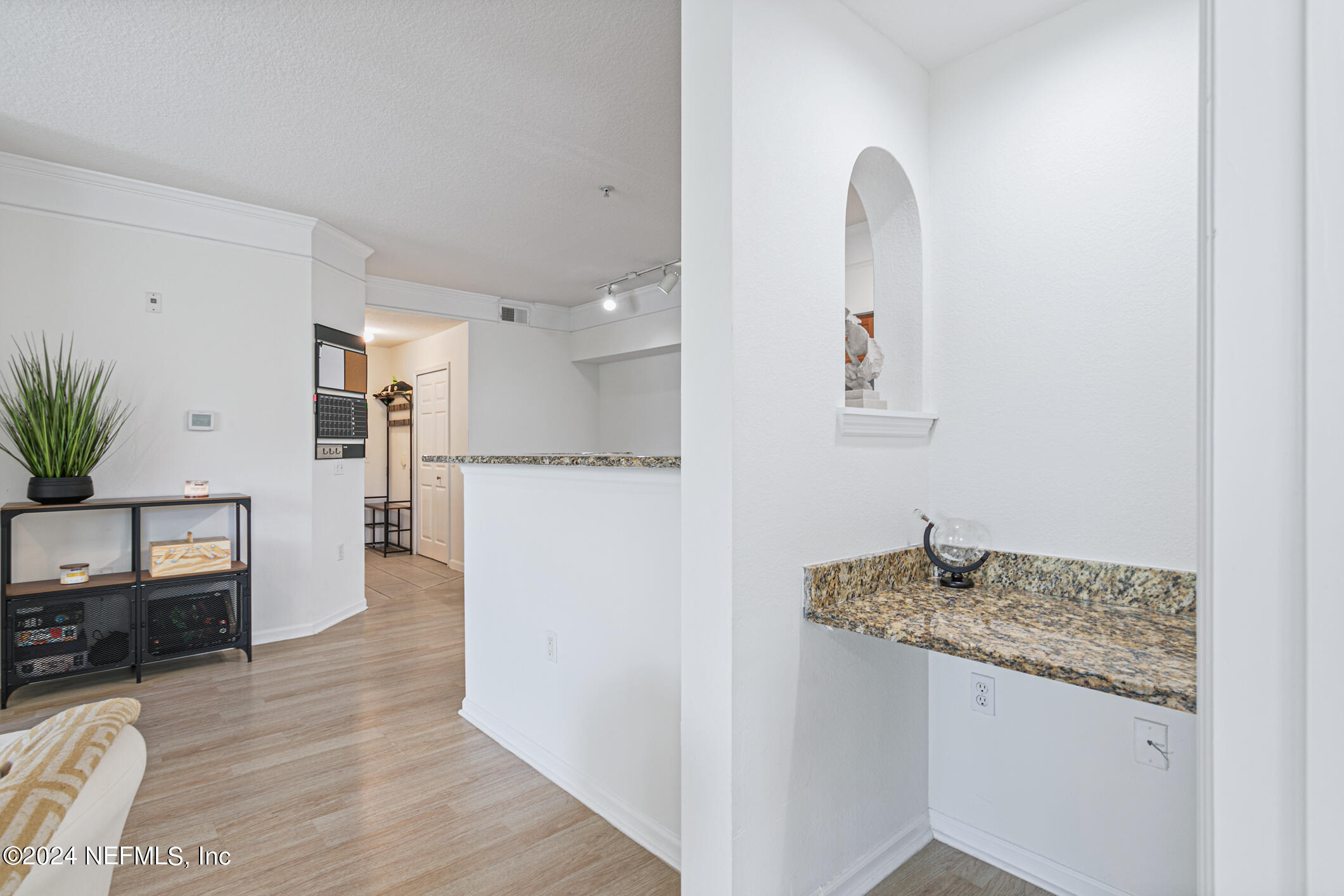 8550 Touchton Road, Unit 927 Jacksonville, FL 32216 - Photo 20 of 59 a kitchen with stainless steel appliances granite countertop a refrigerator and a stove