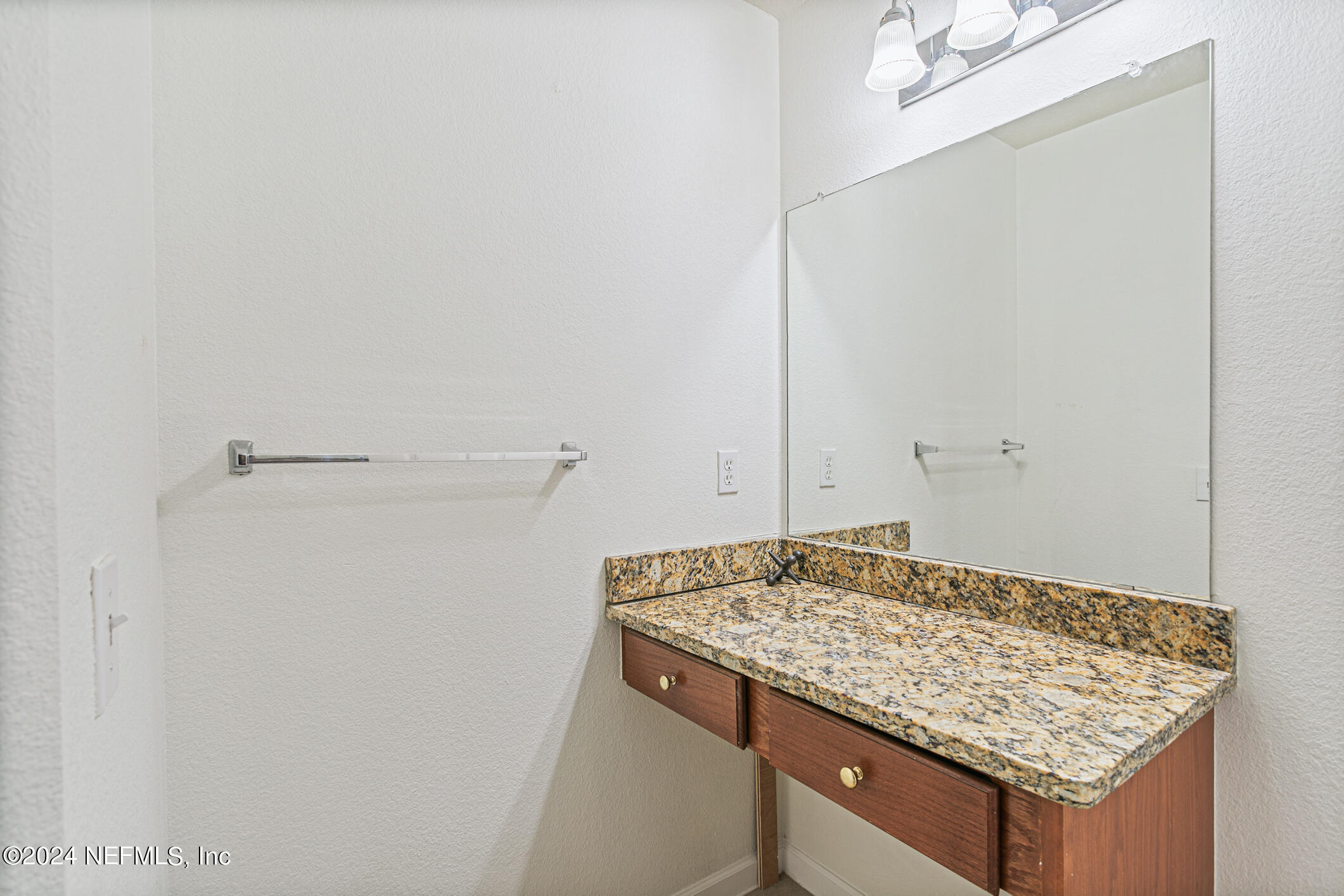 8550 Touchton Road, Unit 927 Jacksonville, FL 32216 - Photo 24 of 59 a utility room with granite countertop