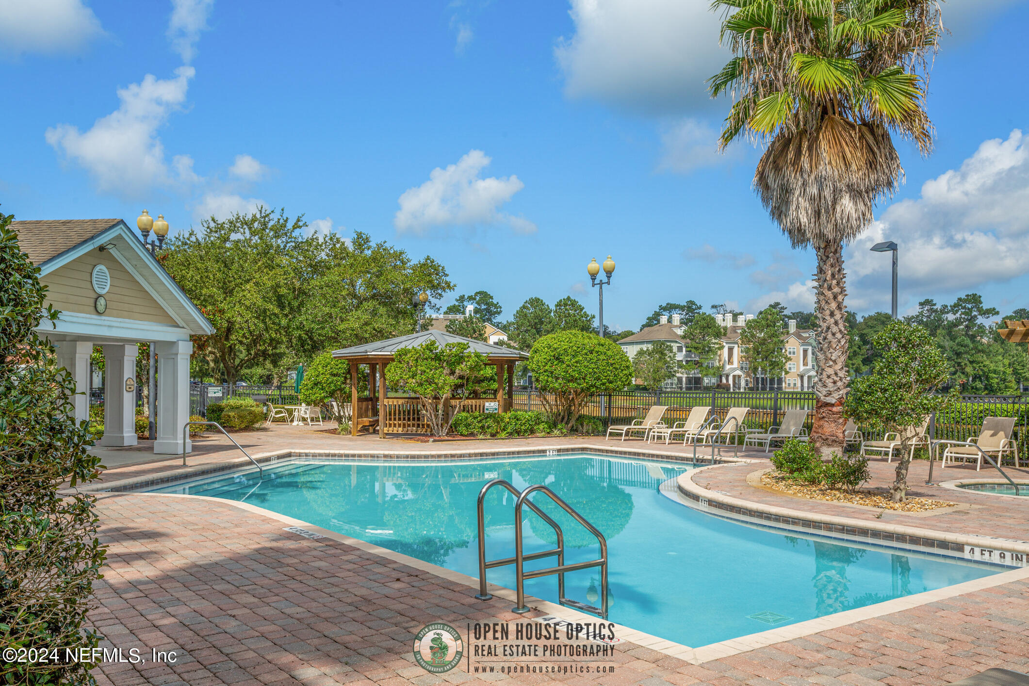 8550 Touchton Road, Unit 927 Jacksonville, FL 32216 - Photo 32 of 59 a view of a house with a swimming pool