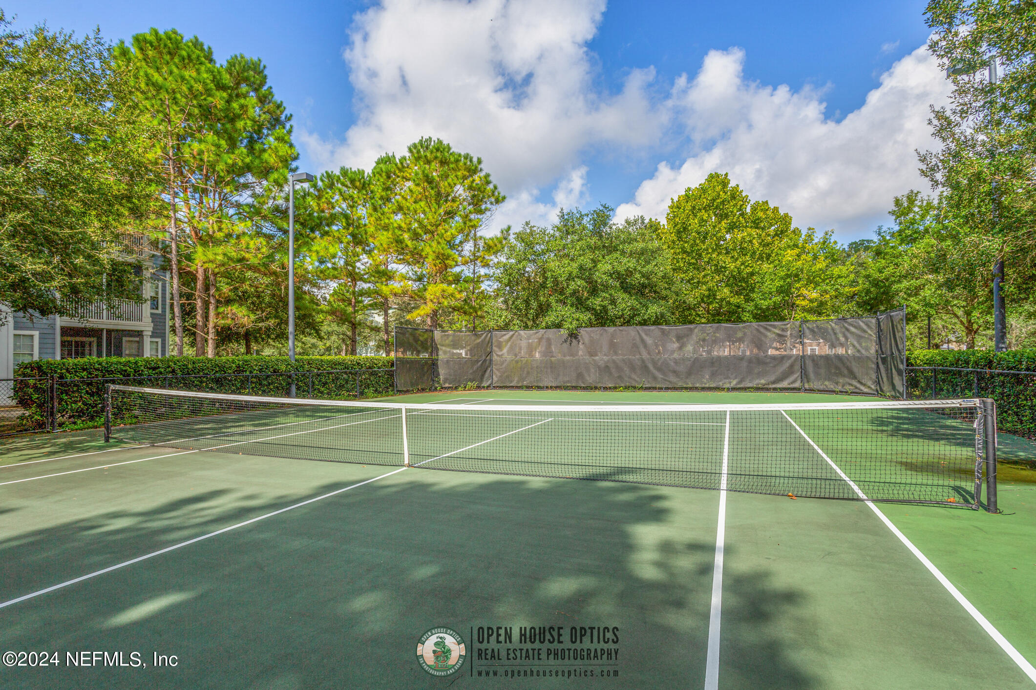 8550 Touchton Road, Unit 927 Jacksonville, FL 32216 - Photo 36 of 59 a view of a tennis court