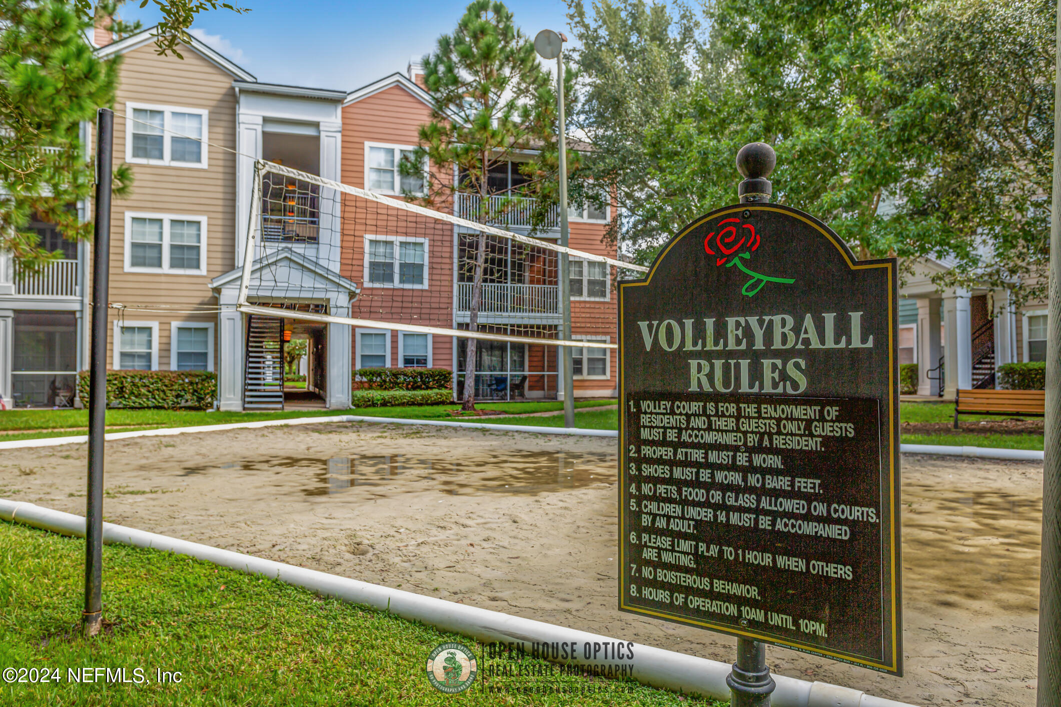 8550 Touchton Road, Unit 927 Jacksonville, FL 32216 - Photo 39 of 59 a front view of a residential apartment building with a yard