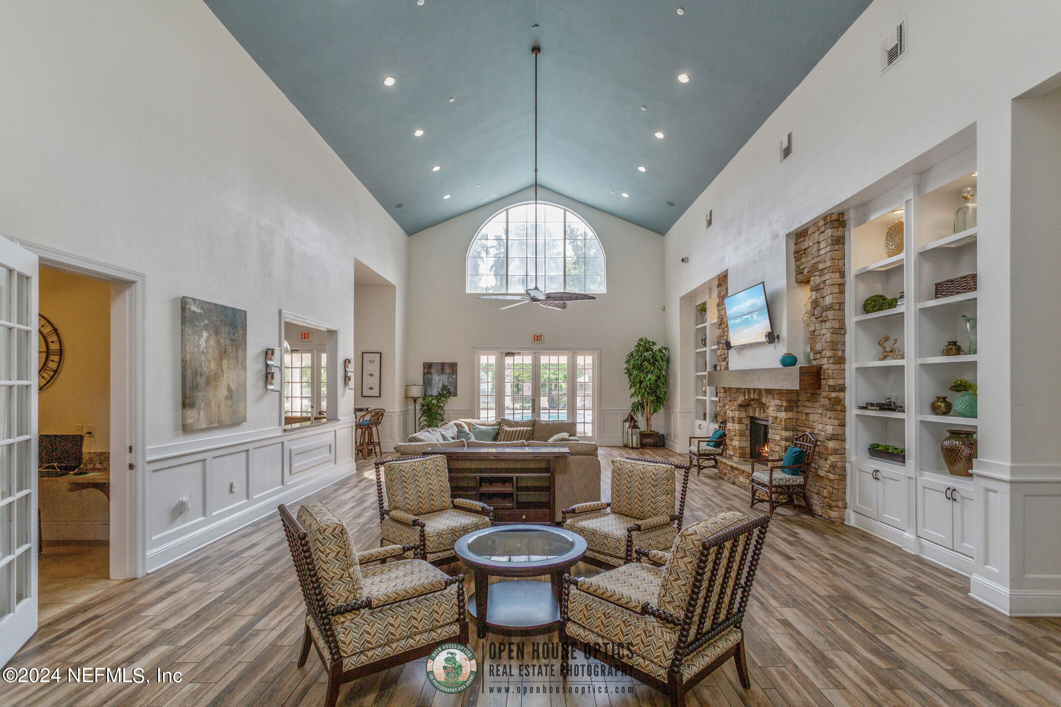 8550 Touchton Road, Unit 927 Jacksonville, FL 32216 - Photo 40 of 59 a dining room with furniture a chandelier and wooden floor
