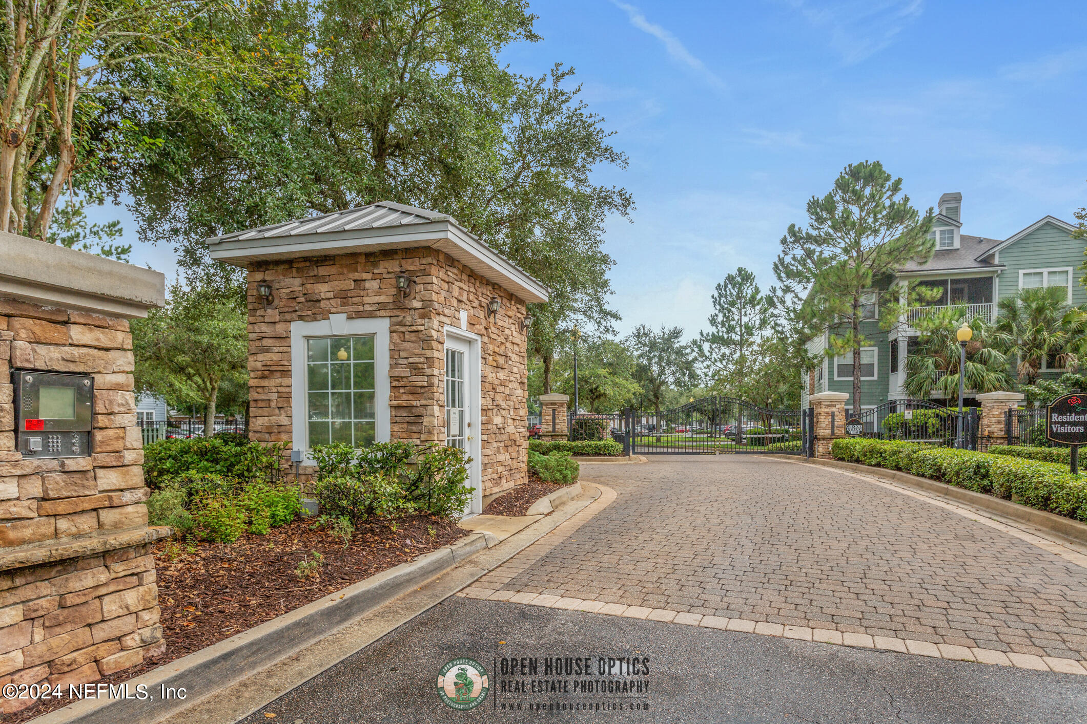 8550 Touchton Road, Unit 927 Jacksonville, FL 32216 - Photo 52 of 59 a front view of a house with a yard and trees