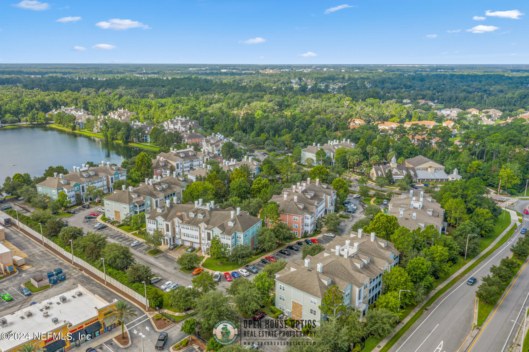 8550 Touchton Road, Unit 927 Jacksonville, FL 32216 - Photo 55 of 59 an aerial view of residential houses with outdoor space and river