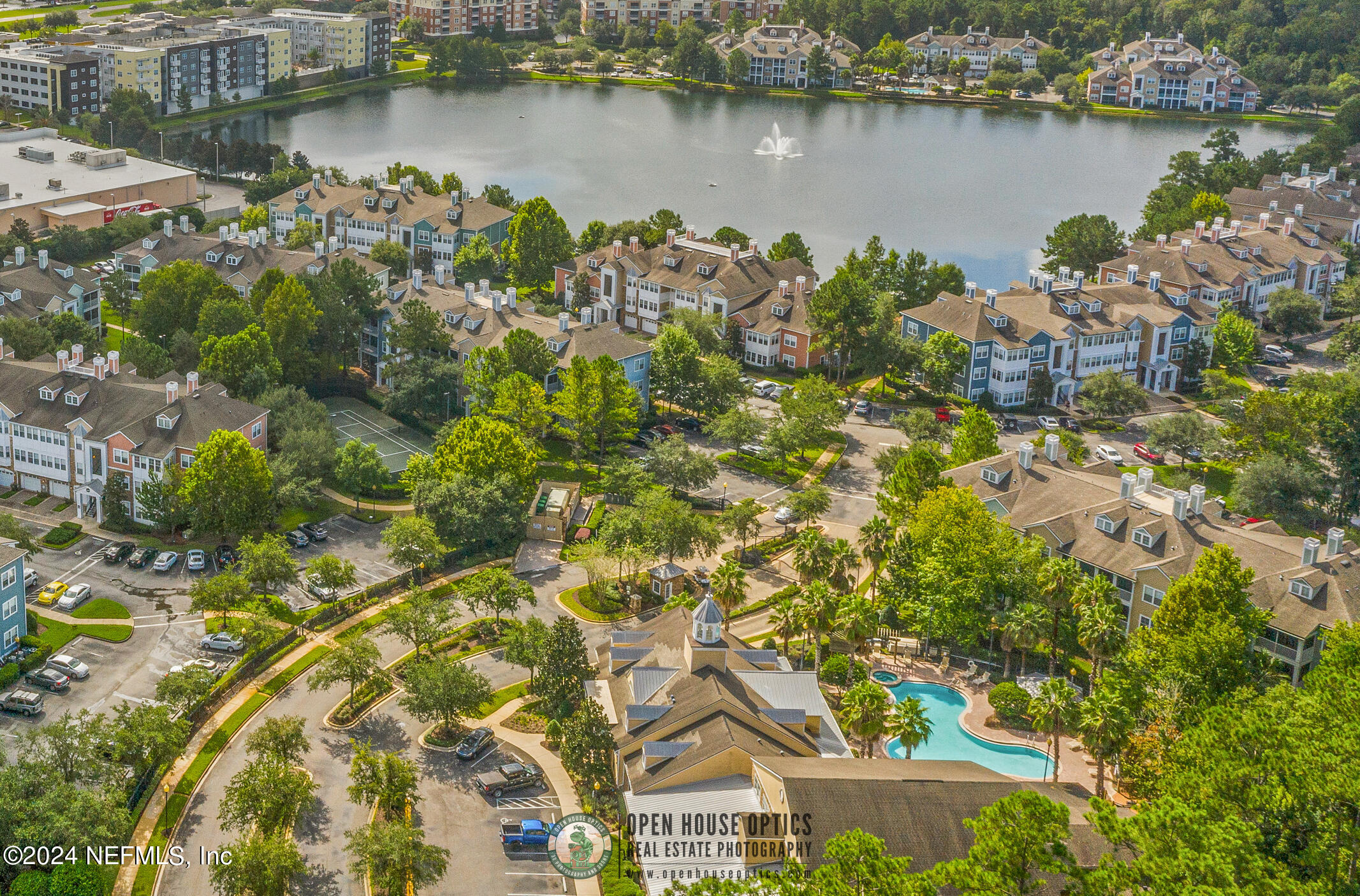 8550 Touchton Road, Unit 927 Jacksonville, FL 32216 - Photo 57 of 59 an aerial view of a residential houses with outdoor space and seating area