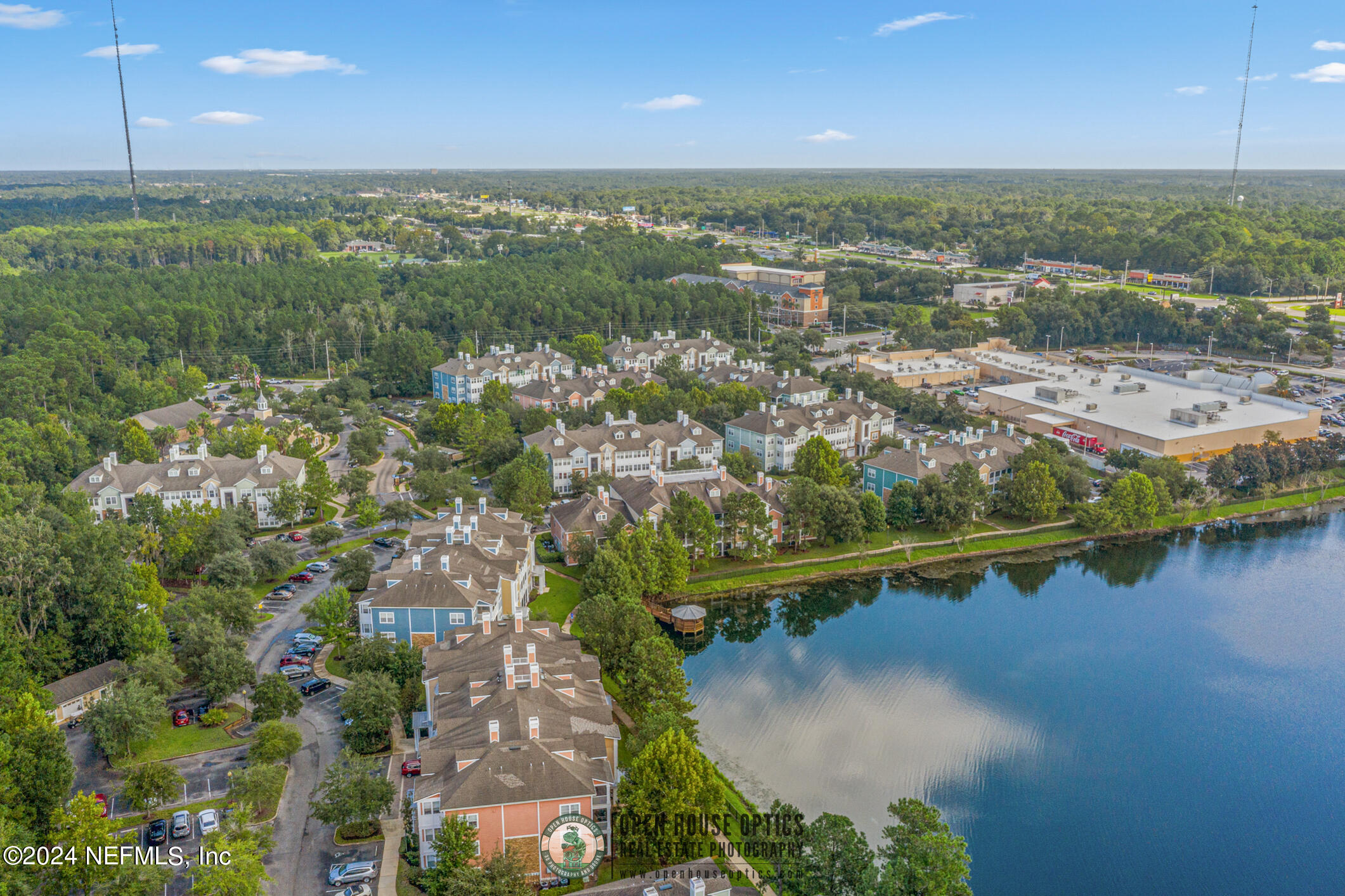 8550 Touchton Road, Unit 927 Jacksonville, FL 32216 - Photo 59 of 59 an aerial view of residential houses with outdoor space and river