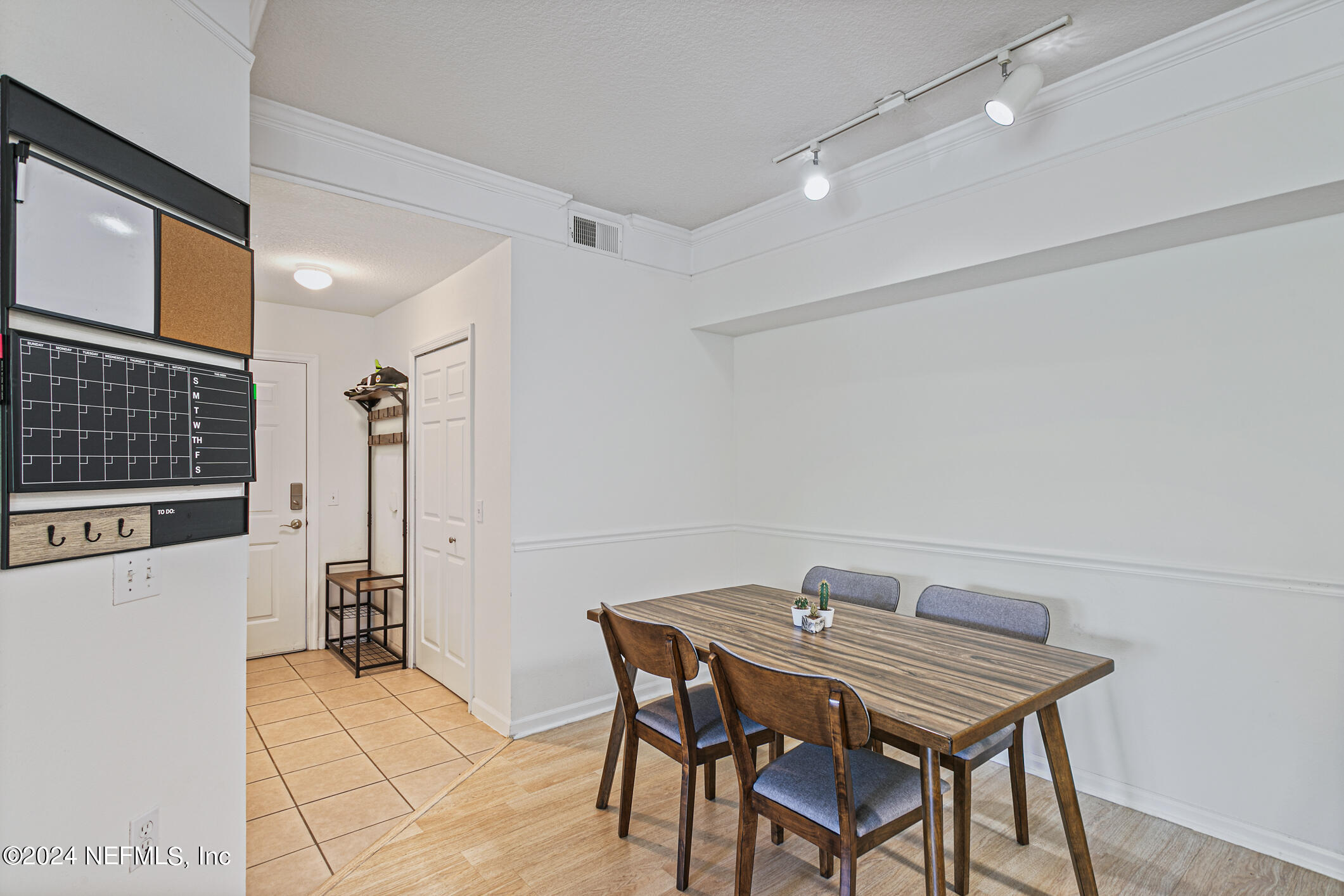 8550 Touchton Road, Unit 927 Jacksonville, FL 32216 - Photo 8 of 59 a view of a dining room with furniture