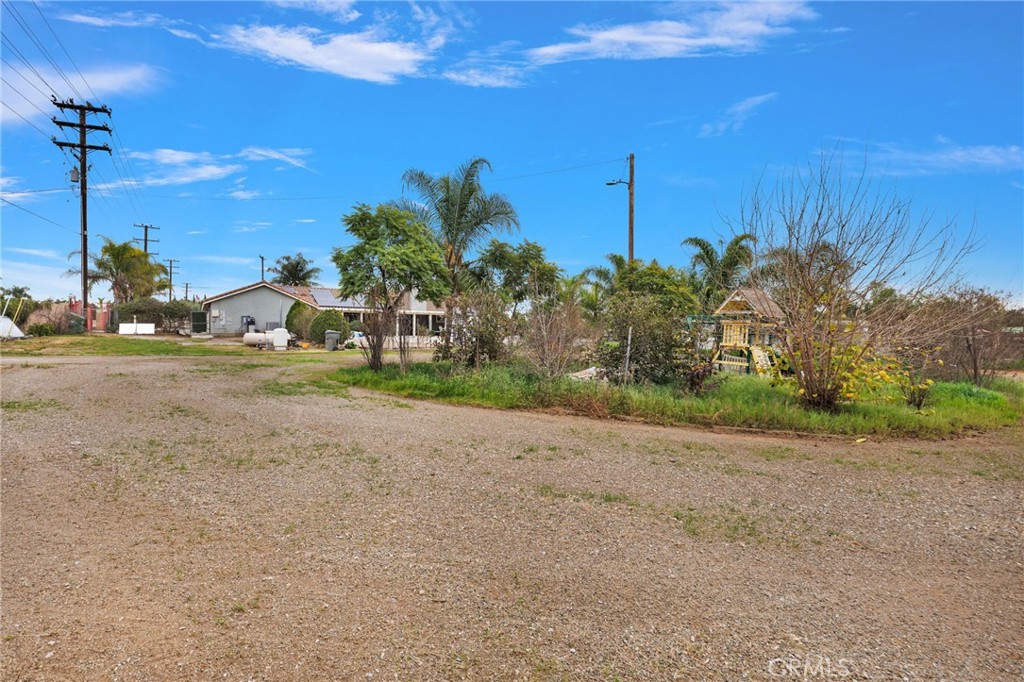 17777 Brazier Drive Riverside, CA 92508 - Photo 34 of 55 a view of a road with a building in the background