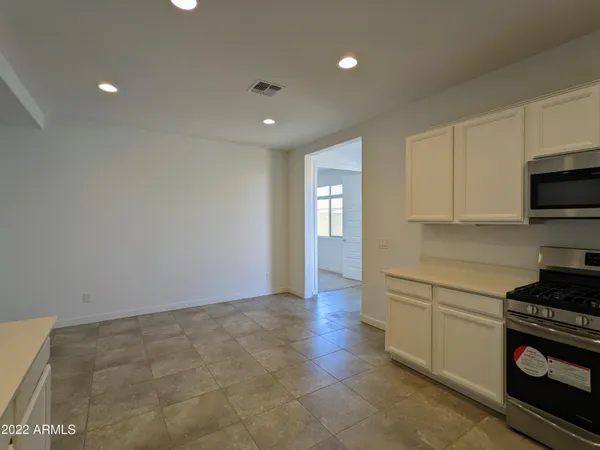 a view of a room that has a window in it