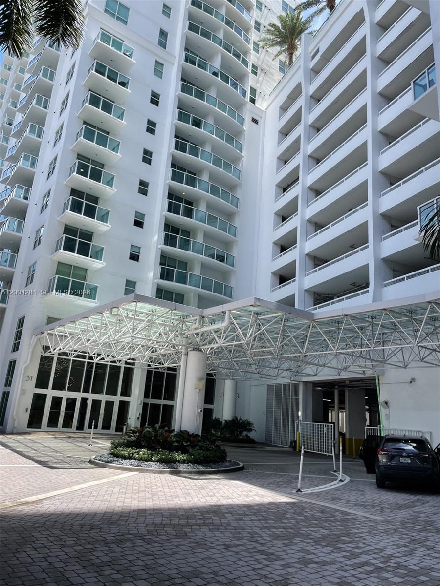 41 Southeast 5th Street, Unit 1614 Miami, FL 33131 - Photo 1 of 23 a view of a building with barbeque